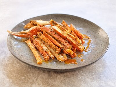 Ovnsbakt snøkrabbe med urtesmør