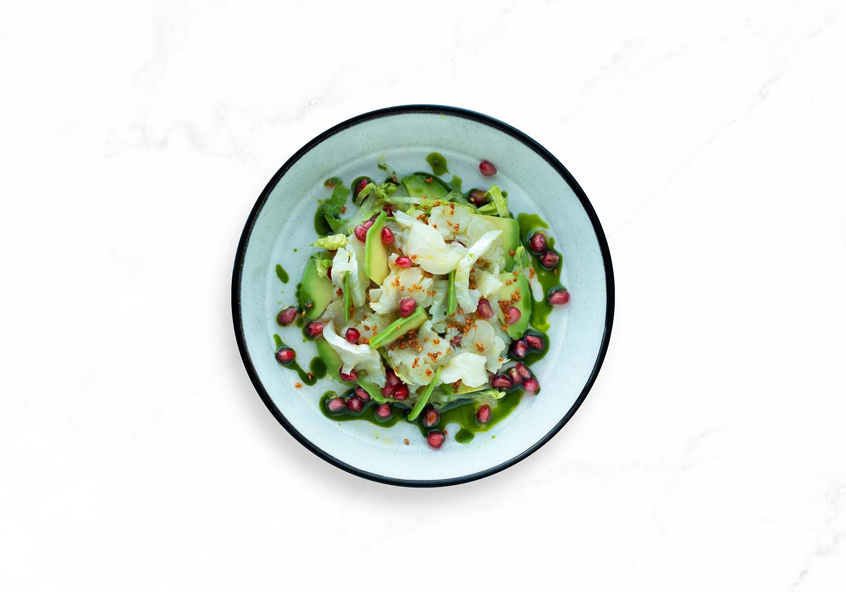 Tørrfisk-ceviche med avokado og granateple